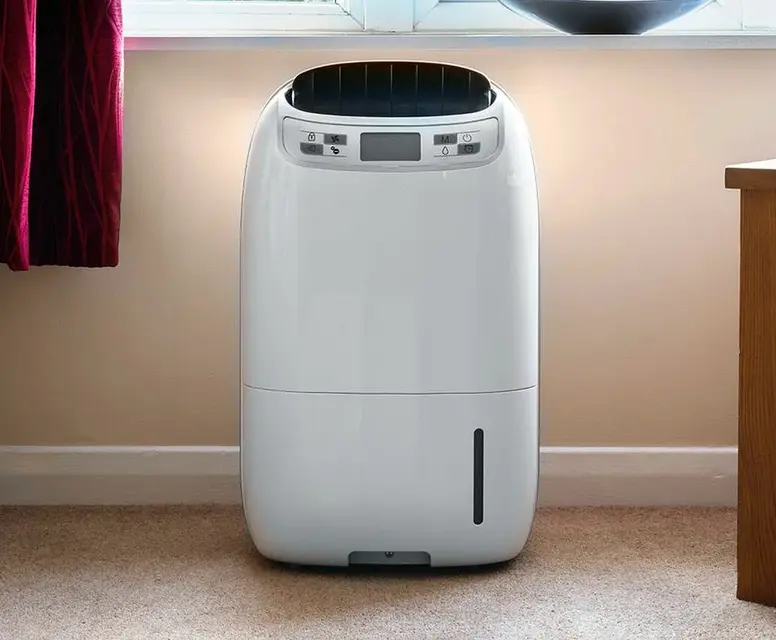 Air dehumidifier installed in a home setting, enhancing indoor air quality and moisture control, relevant to air quality solutions in Canton.