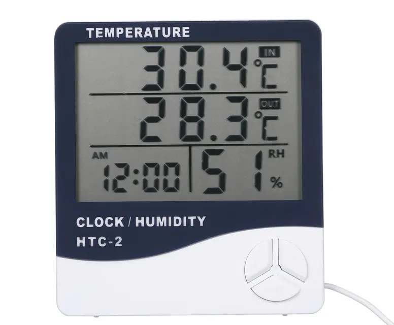 Digital clock and humidity monitor displaying indoor temperature of 30.4&deg;C, outdoor temperature of 28.3&deg;C, and humidity level of 51%, illustrating whole-home humidity control solutions for Garden City residents.