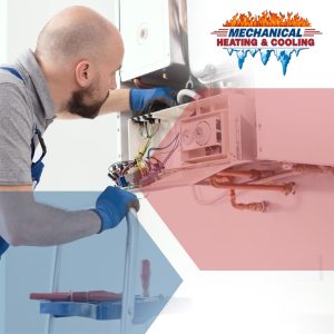 Technician performing furnace repair and heater installation for residential heating system in Dearborn